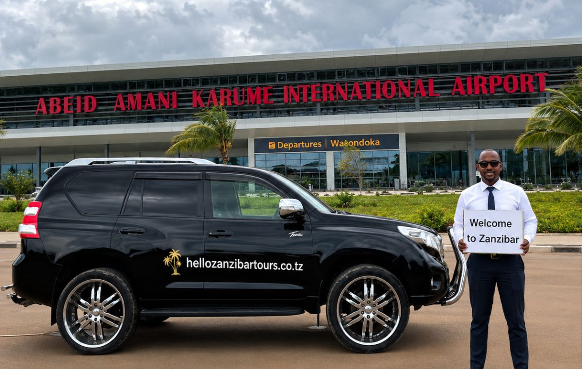 Local licensed Zanzibar driver holding a name board in the airport arrivals hall
