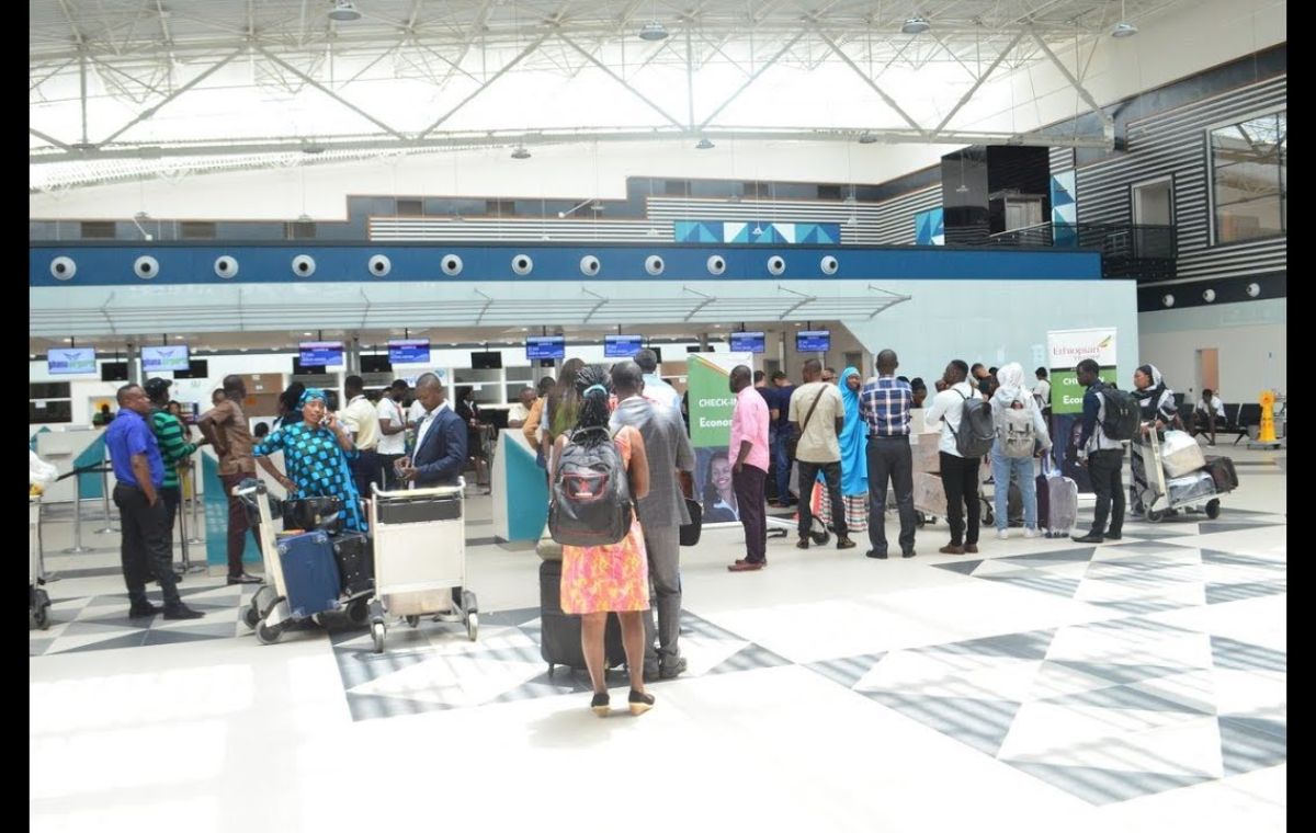 Busy arrivals hall during Zanzibar peak travel season